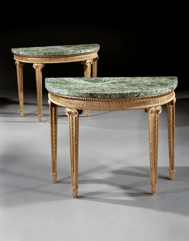 A PAIR OF GEORGE III SEMI-ELLIPTIC GILTWOOD SIDE TABLES